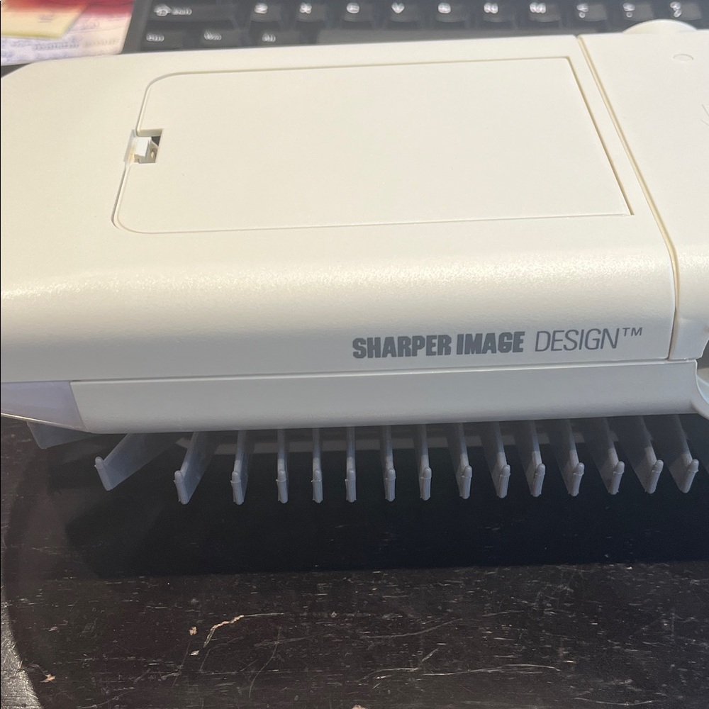Sharper Image Design White electric rotating tie rack with light